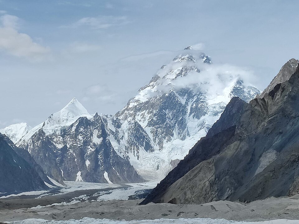 A snowy mountain peak of K2 in clear weather. taken by Mustafa Aldahabi