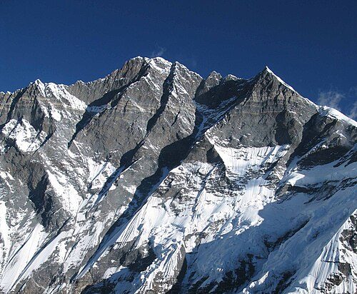View of the dramatic icy cliffs of Lhotse’s south wall showing its distinct peaks
