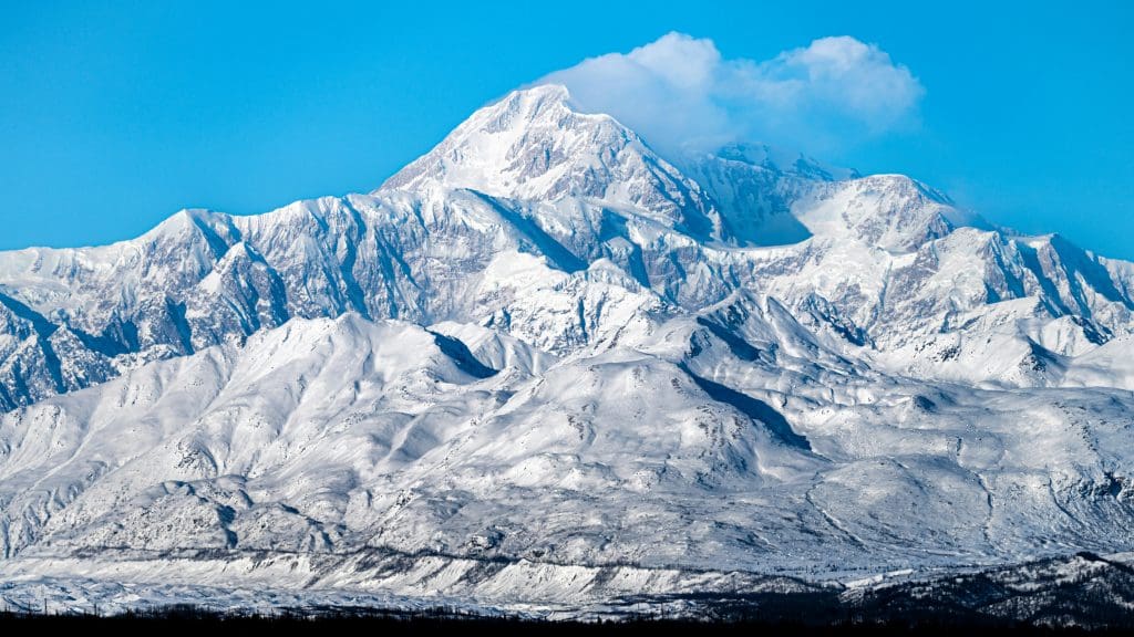Snow-capped Mount McKinley rising above the Alaskan landscape.